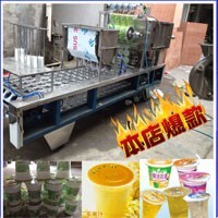 塑料杯装豆浆灌装封口机 豆浆包装机 塑料杯包装机图片_高清图_细节图-温州市瓯海梧田进诚机械厂 -