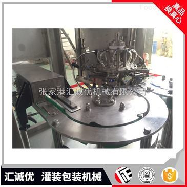 揭秘高效生产核心 冲洗、灌装、封口三合一饮料包装机